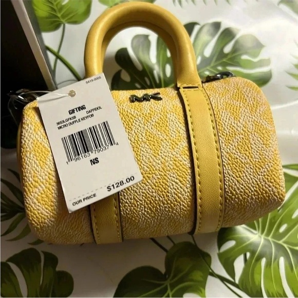 - NWT - Michael Kors mini duffle keychain or Fob.  Daffodil color. - Picture 6 of 8